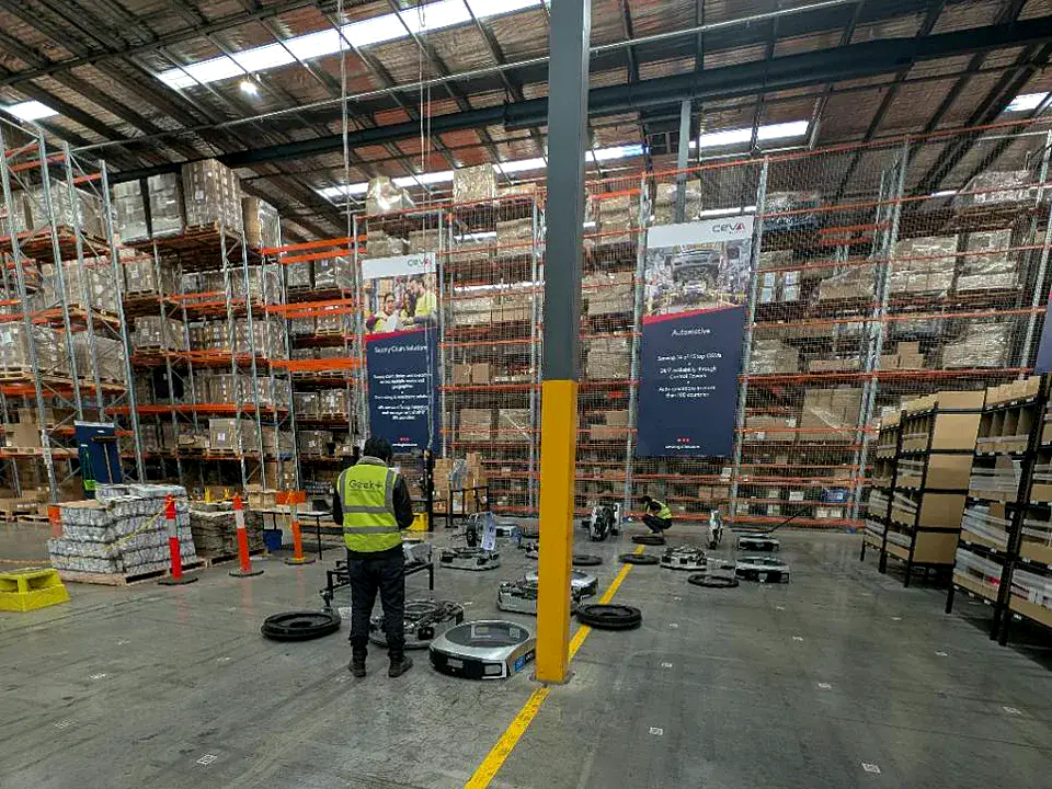 Geek+ technicians carrying out planned robot maintenance at CEVA Logistics