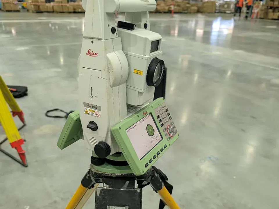 Survey total station used for precise warehouse layout control